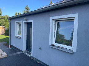 Ferienwohnung mit Fußbodenheizung nahe Messe, gratis Parkplatz und Abstellplatz E - Bike